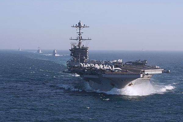 The aircraft carrier USS Harry S. Truman (CVN 75) and ships assigned to the Harry S. Truman Carrier Strike Group (HSTCSG) transit the Atlantic Ocean while conducting composite training unit exercise (COMPTUEX).